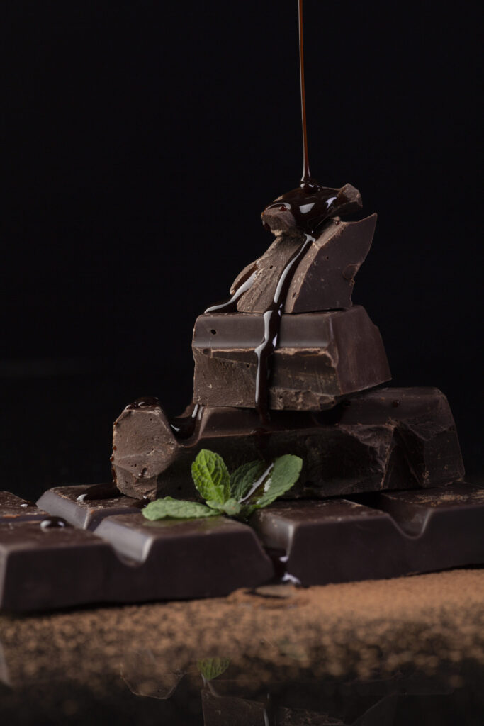 front view chocolate sauce pouring scaled